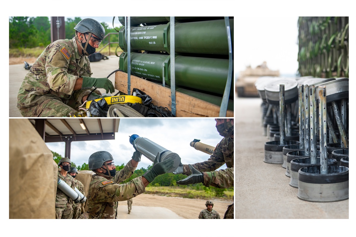 Discarded sabot round cases stack up as trainees take turns firing.